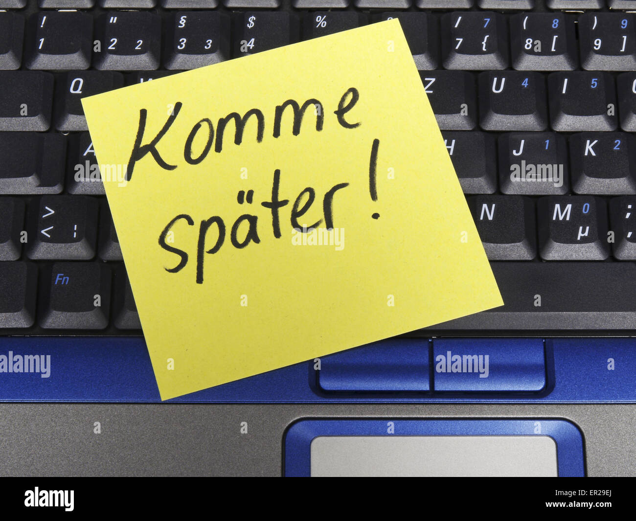 Memo-Hinweis auf Notebook, Komme Später, später wiederkommen Stockfoto