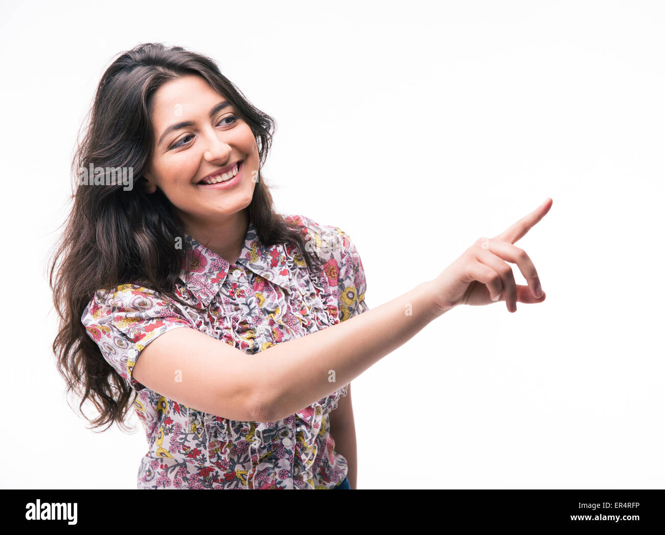 Glückliche Frau Zeigefinger entfernt auf einem weißen Hintergrund isoliert Stockfoto