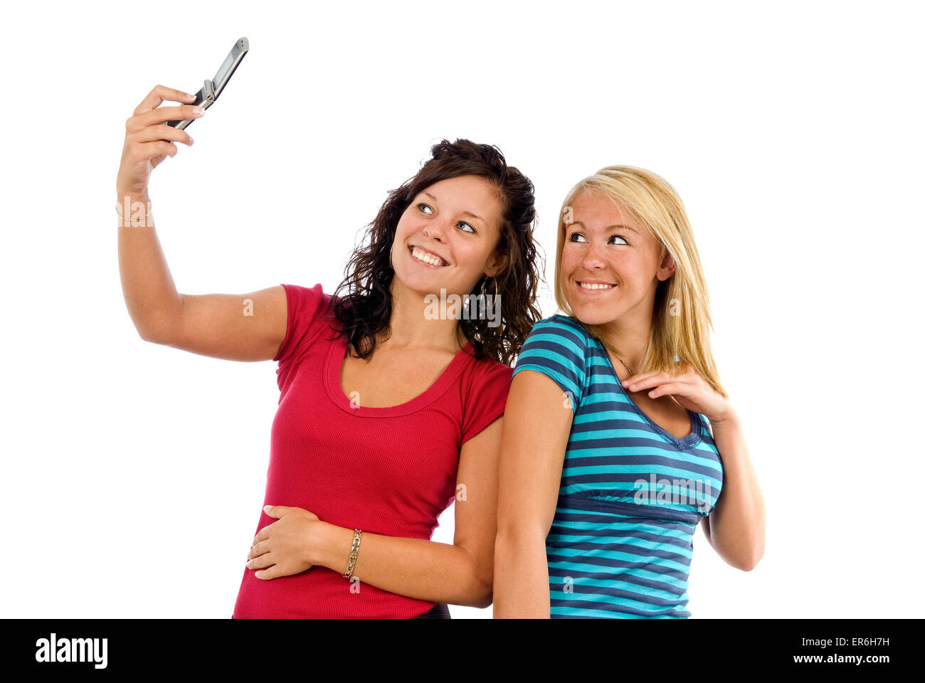 Zwei Freundinnen fotografieren Selfie auf weißem Hintergrund Stockfoto
