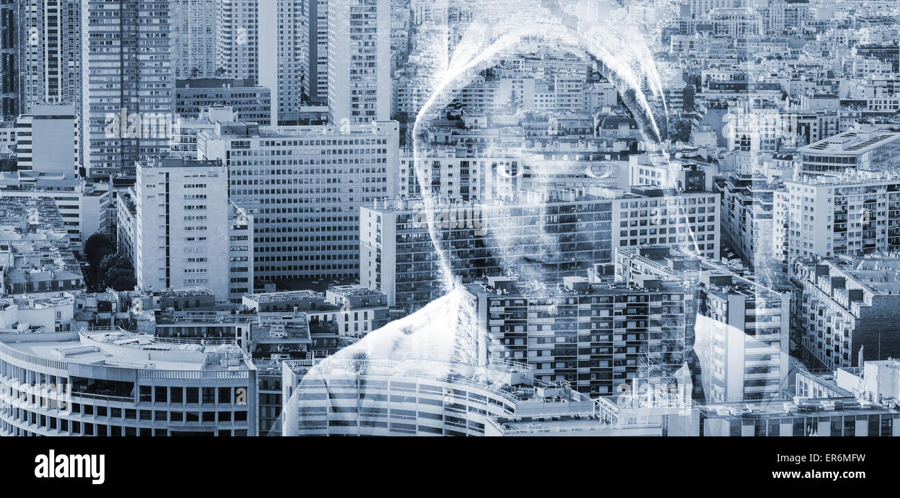 Doppelte Belichtung konzeptuelle Collage mit einem Mann in eine Kapuze über großen modernen Stadtbild Hintergrund Stockfoto
