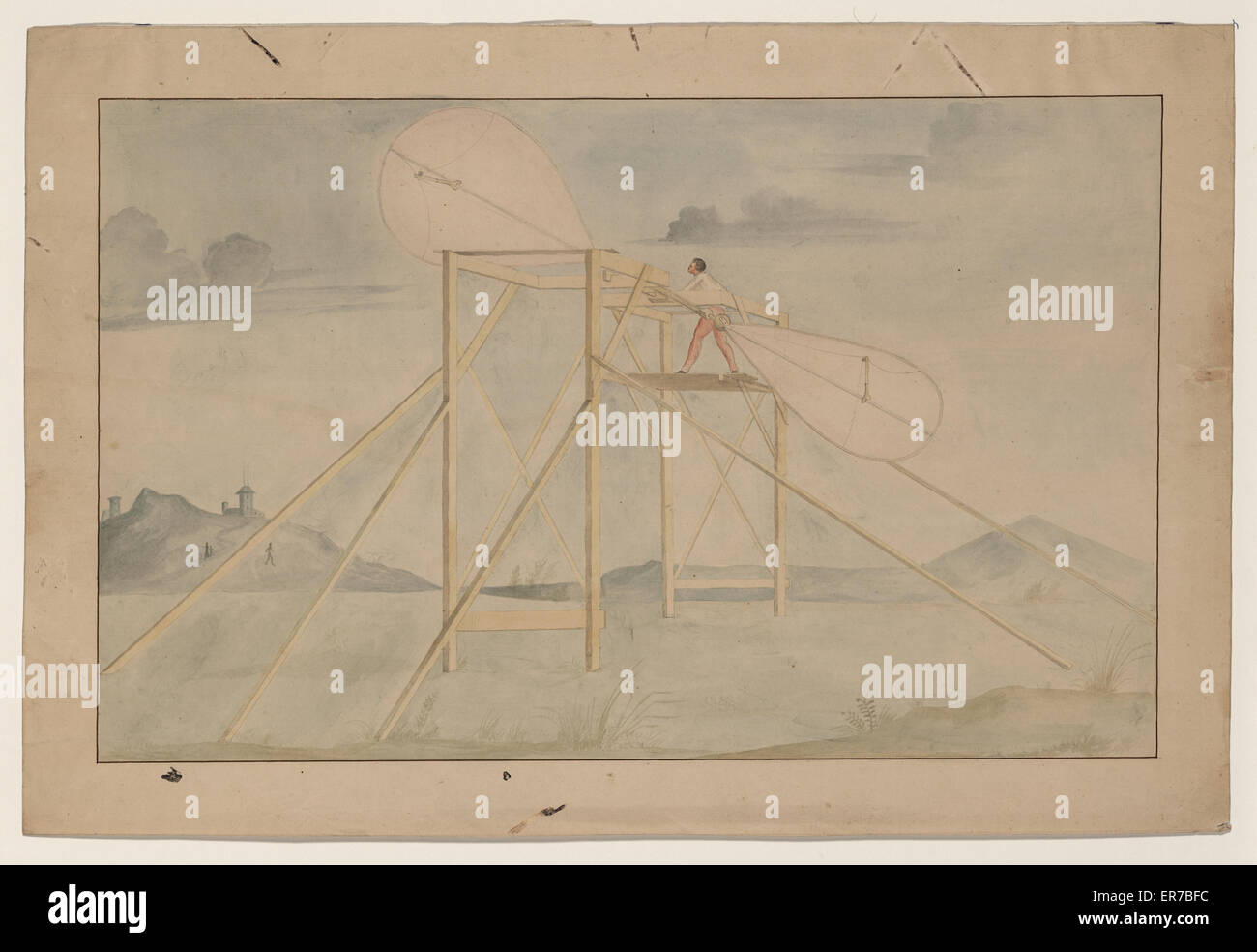 Ein Mann, der auf einer Plattform steht und ein Paddelset manipuliert Stockfoto