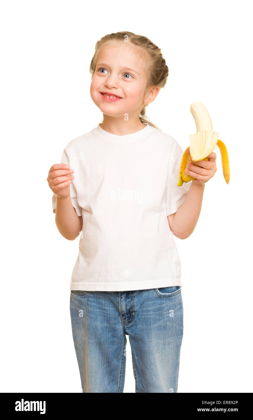 kleine Mädchen essen Bananen Stockfoto