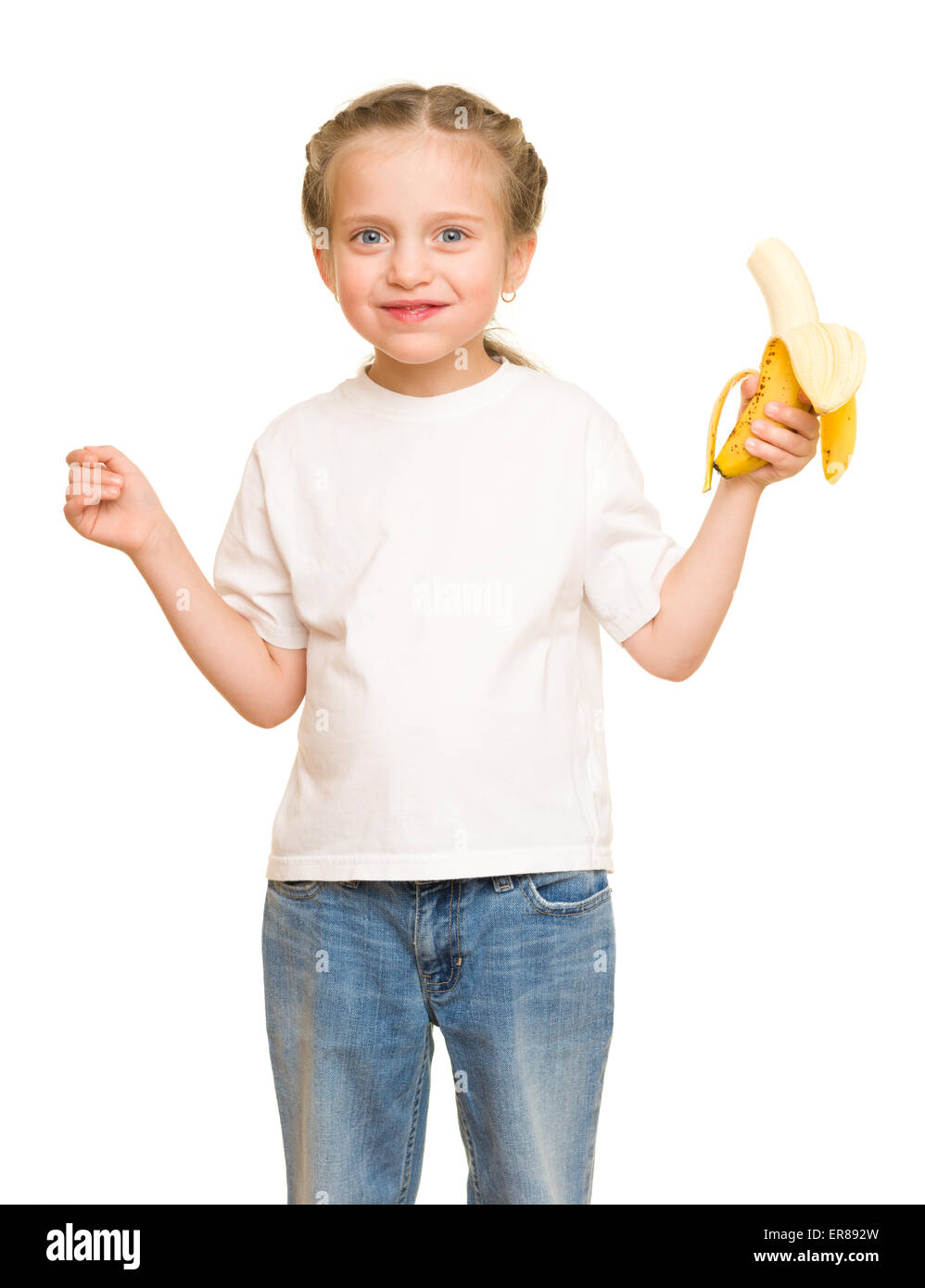 kleine Mädchen essen Bananen Stockfoto