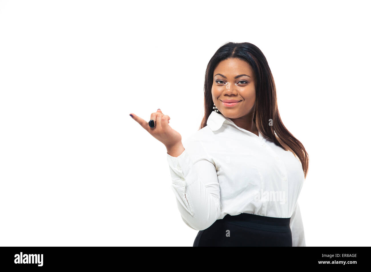 Glücklich Afro amerikanische Geschäftsfrau Zeigefinger entfernt auf einem weißen Hintergrund isoliert. Blick in die Kamera Stockfoto