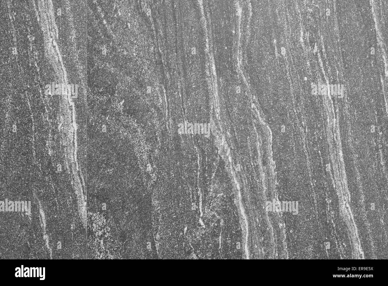 Dunklen grauen Granit glatten Stein Wand Textur Hintergrund Stockfoto
