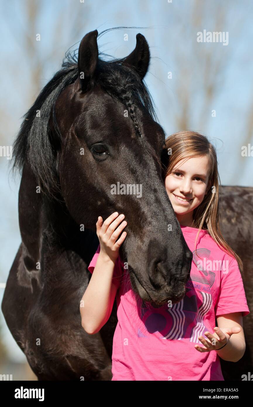 Mädchen und Friesen Stockfoto