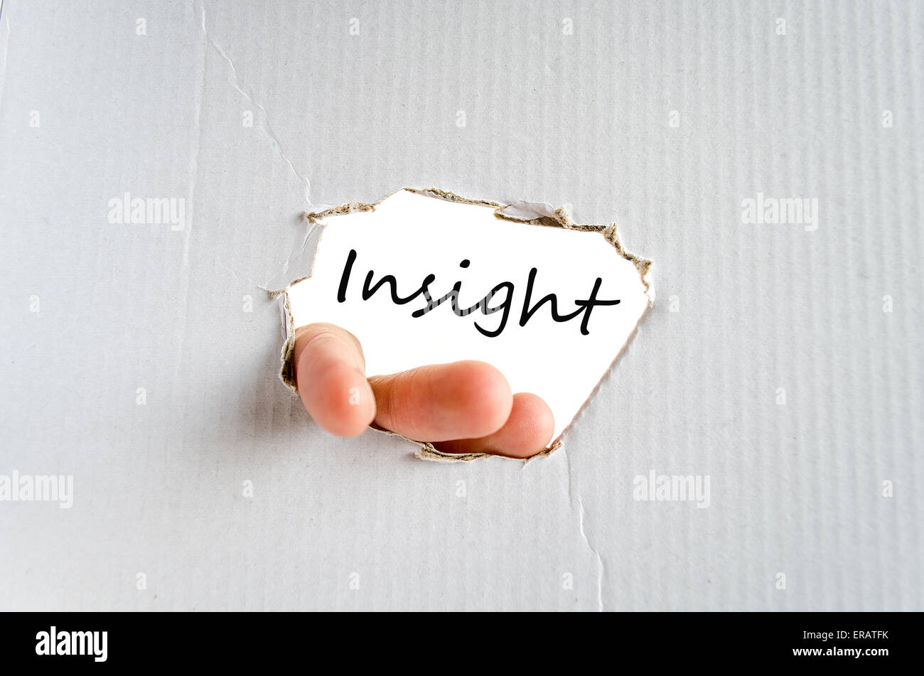Hand und Text auf dem Karton Hintergrund Insight Concept Stockfoto