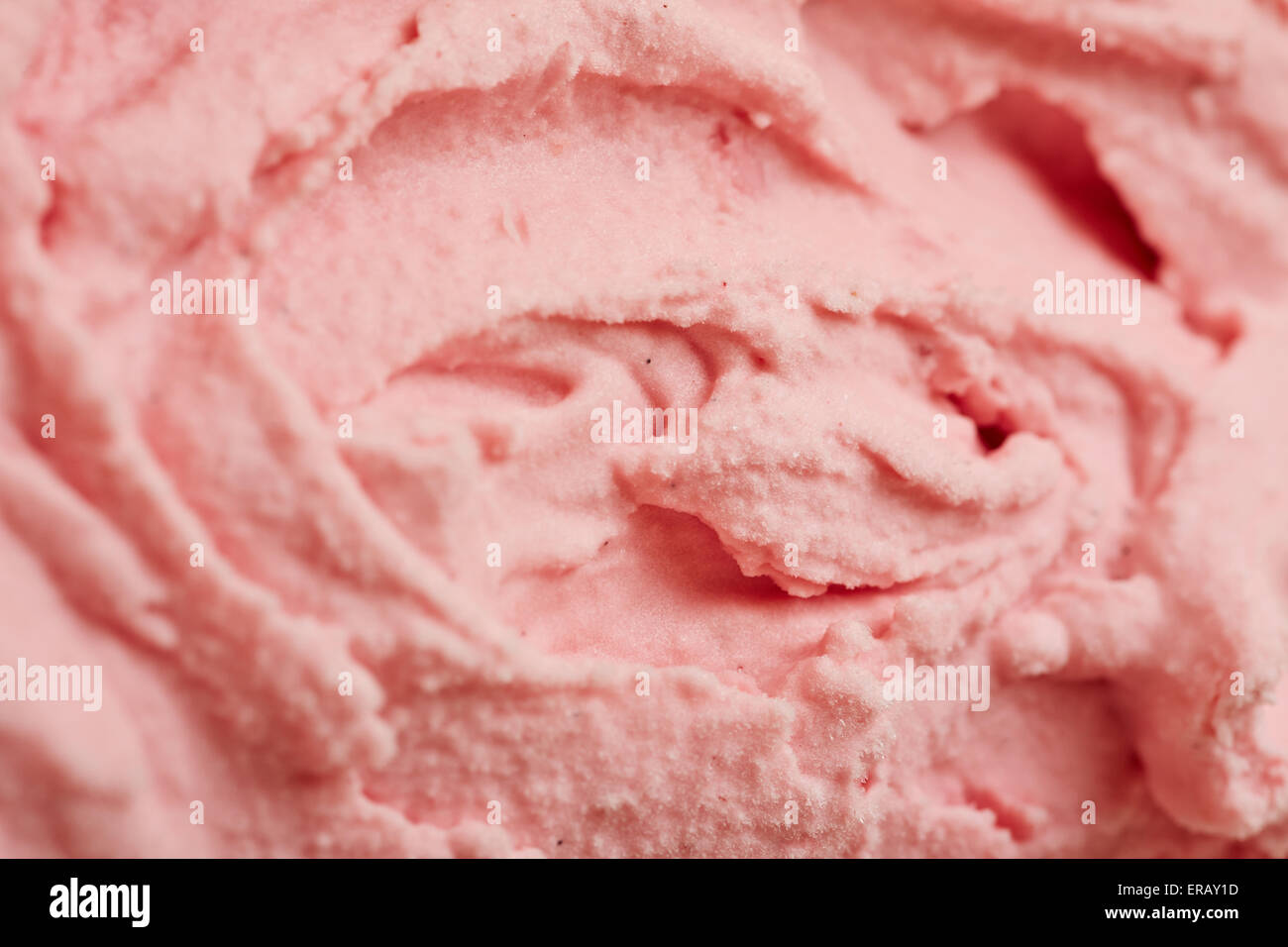 Struktur der Erdbeereis als rosa Hintergrund Stockfoto Struktur der Erdbeereis als rosa Hintergrund Stockfoto