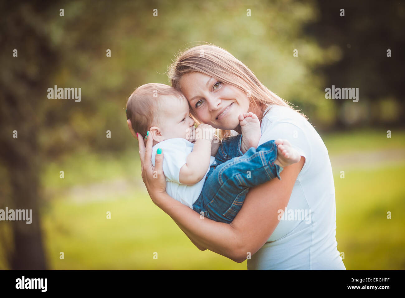 Glückliche Mutter mit baby Stockfoto