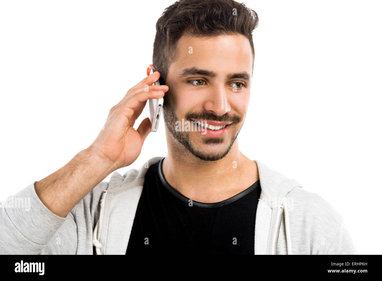 Glücklich Jüngling reden über Handy isoliert auf weißem Hintergrund Stockfoto