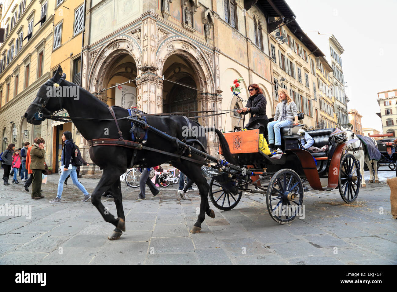 Pferdekutsche in Piazza San Giovanni, Kathedrale von Florenz Stockfoto