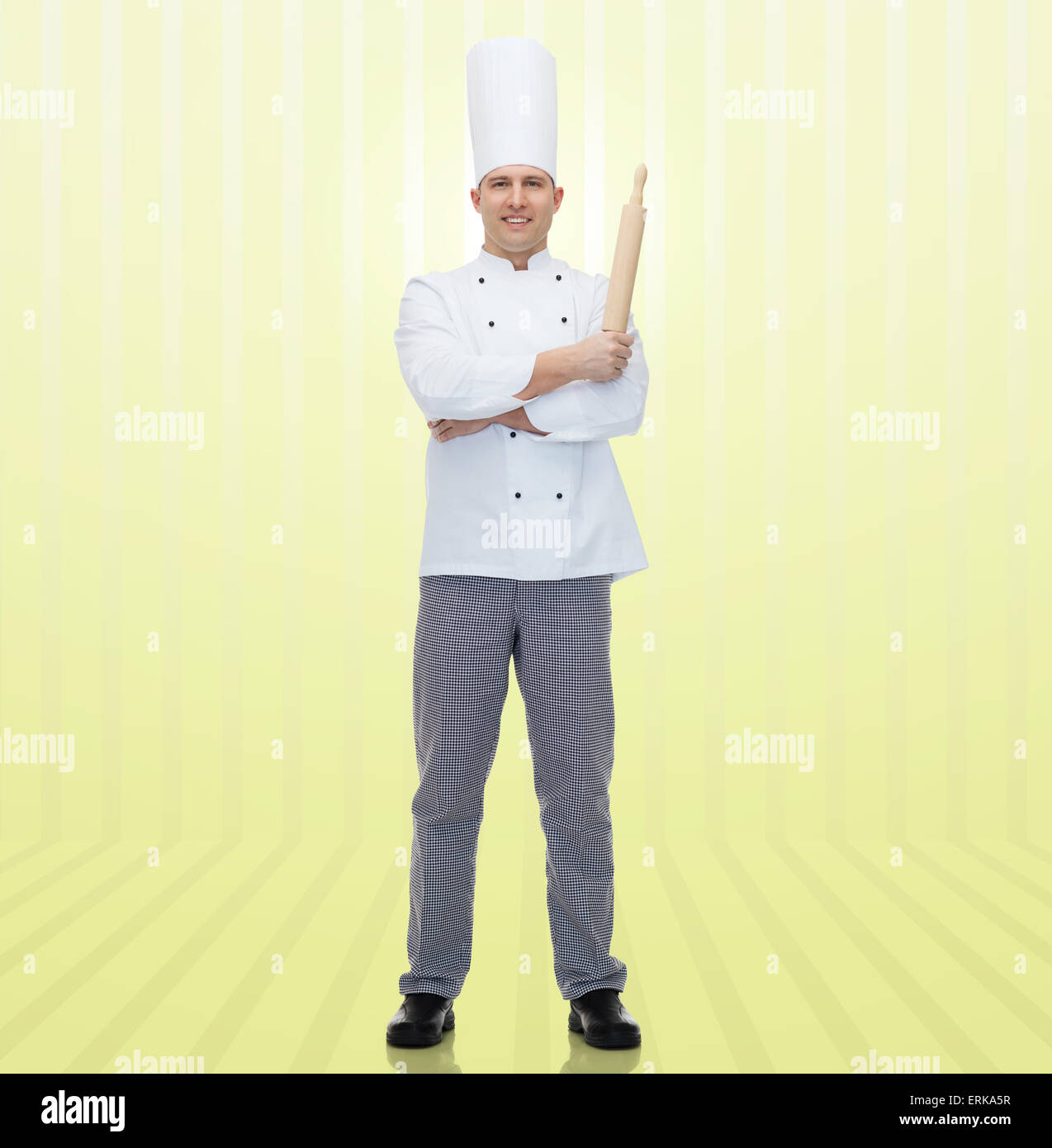 glücklich männlichen Chef-Koch holding Nudelholz Stockfoto