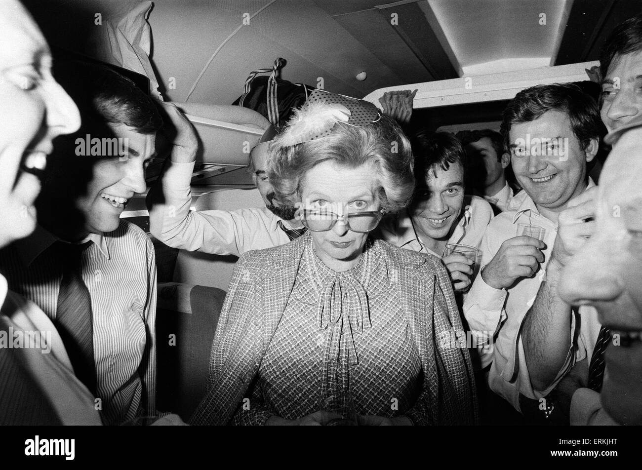 Margaret Thatcher British Prime Minister   December 1984 relaxes at an impromptu party on board the VC 10 plane with Downing Street Staff and Press, who accompanied her on her World Tour.