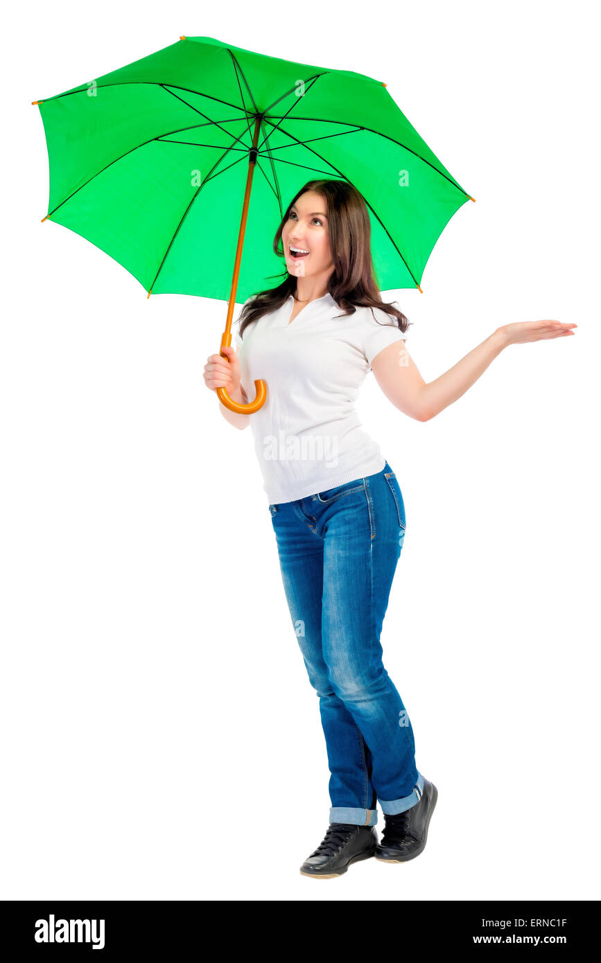 Frau mit grünem Schirm prüft, ob es regnet Stockfoto