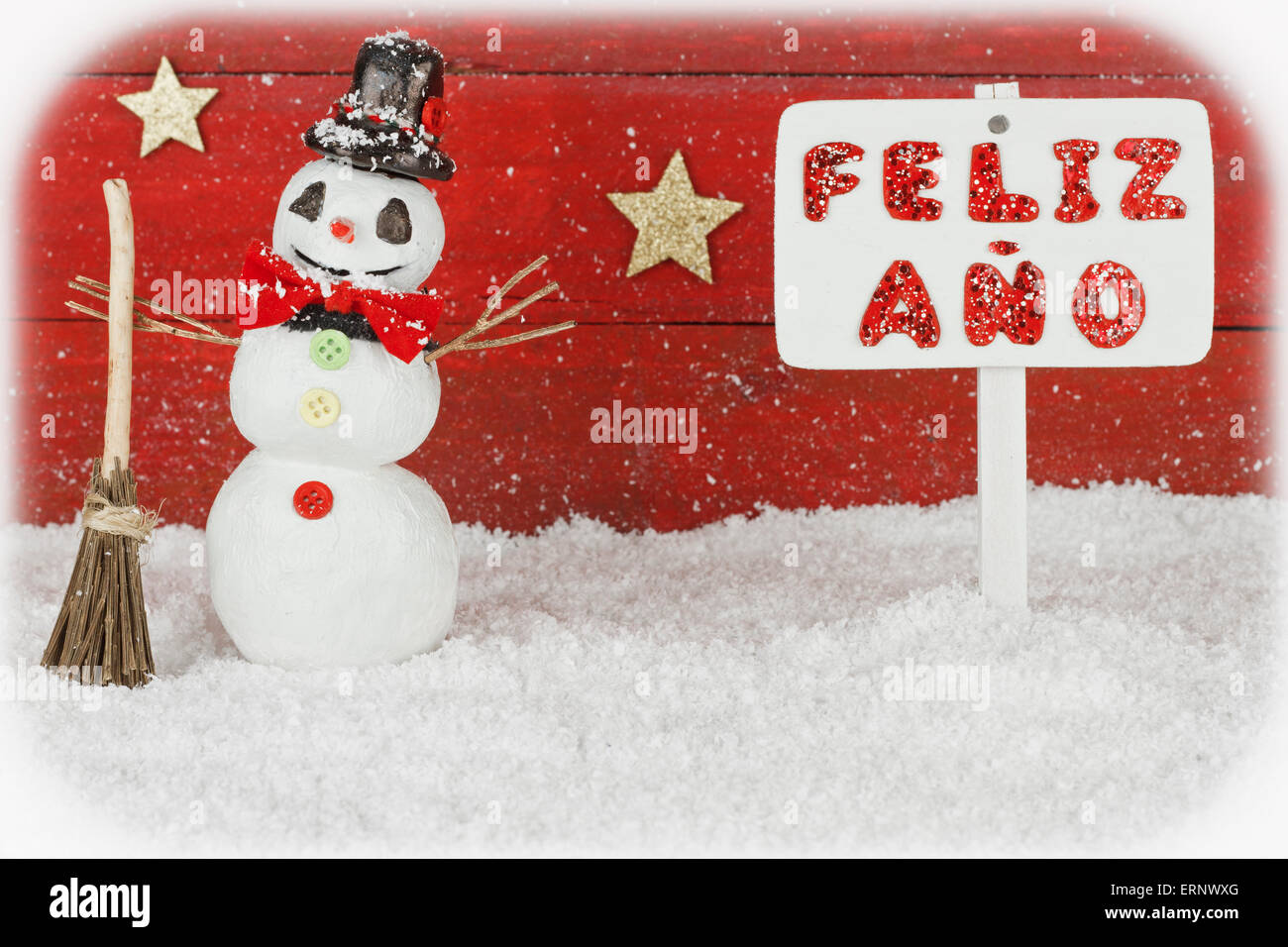 Einen Schneemann mit einem Schild mit den Worten Prosit Neujahr auf Spanisch Stockfoto