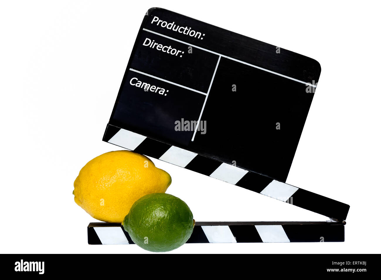 Zitrus-Geschichte - Zitrone, Limette und Film Klappe auf der Bühne Stockfoto