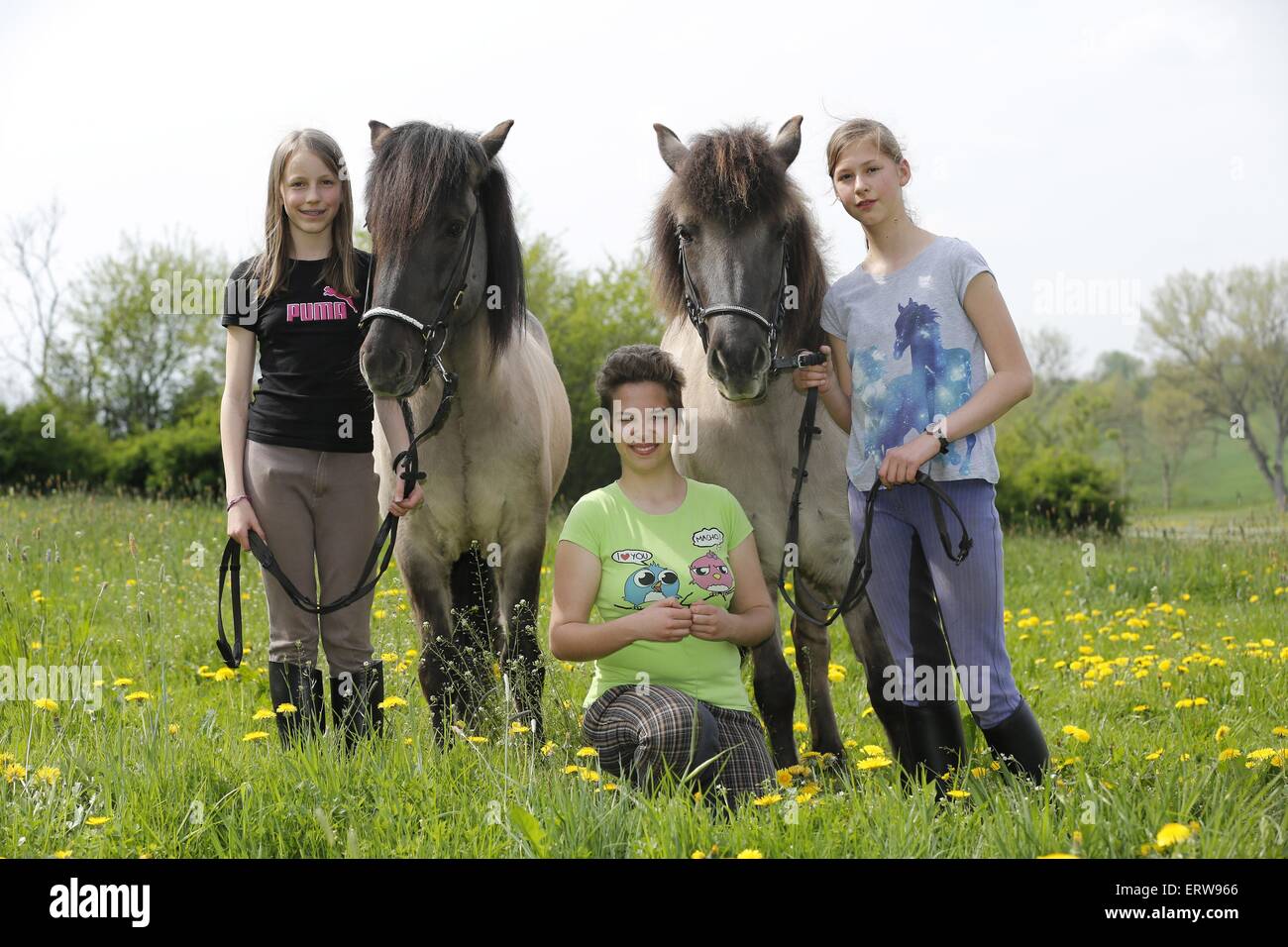 Mädchen mit Ponys Stockfoto