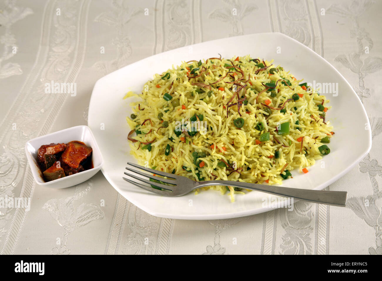 Reis mit Mango Pickles in Platte Indien PR #743AH Stockfoto