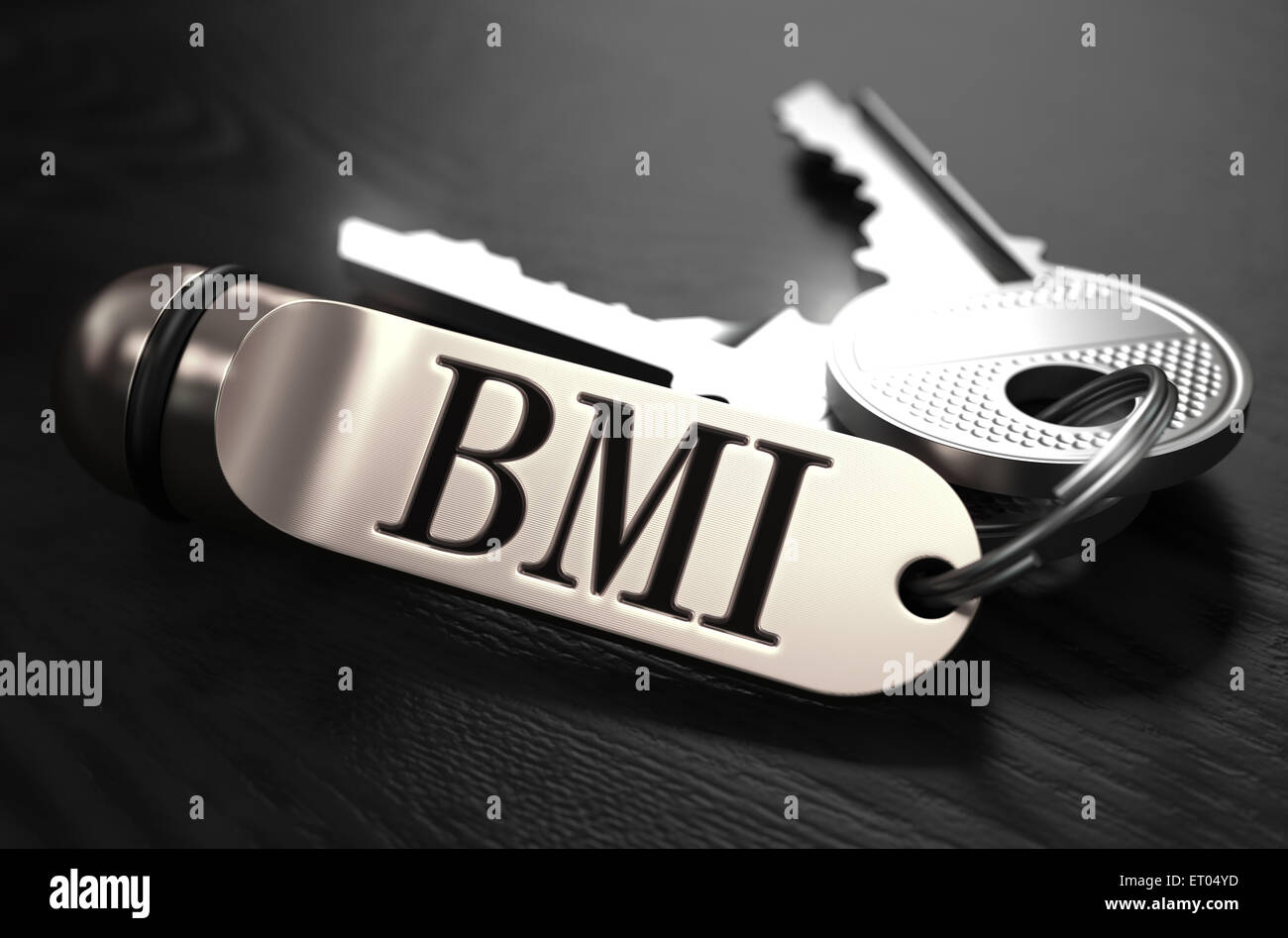 BMI-Konzept. Schlüssel mit Schlüsselring. Stockfoto