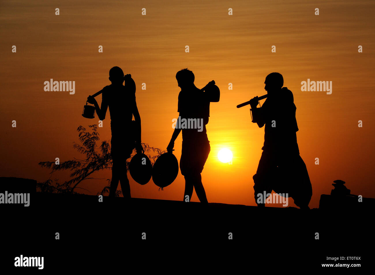 Farmer, die nach Hause zurückkehren, Rajasthan, Indien Stockfoto