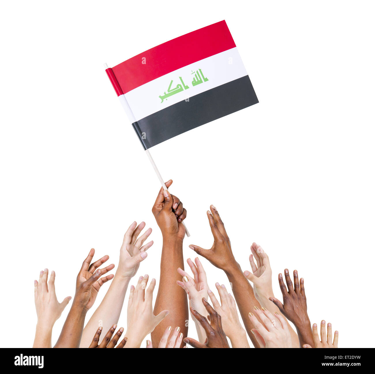 Menschliche Hand mit Irak Fahne unter Gruppe von multi-ethnischen Hände Stockfoto