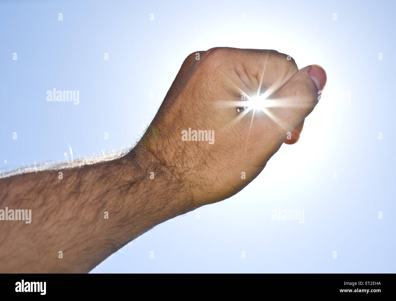 Sonne "in die Hand des Mannes". Stockfoto