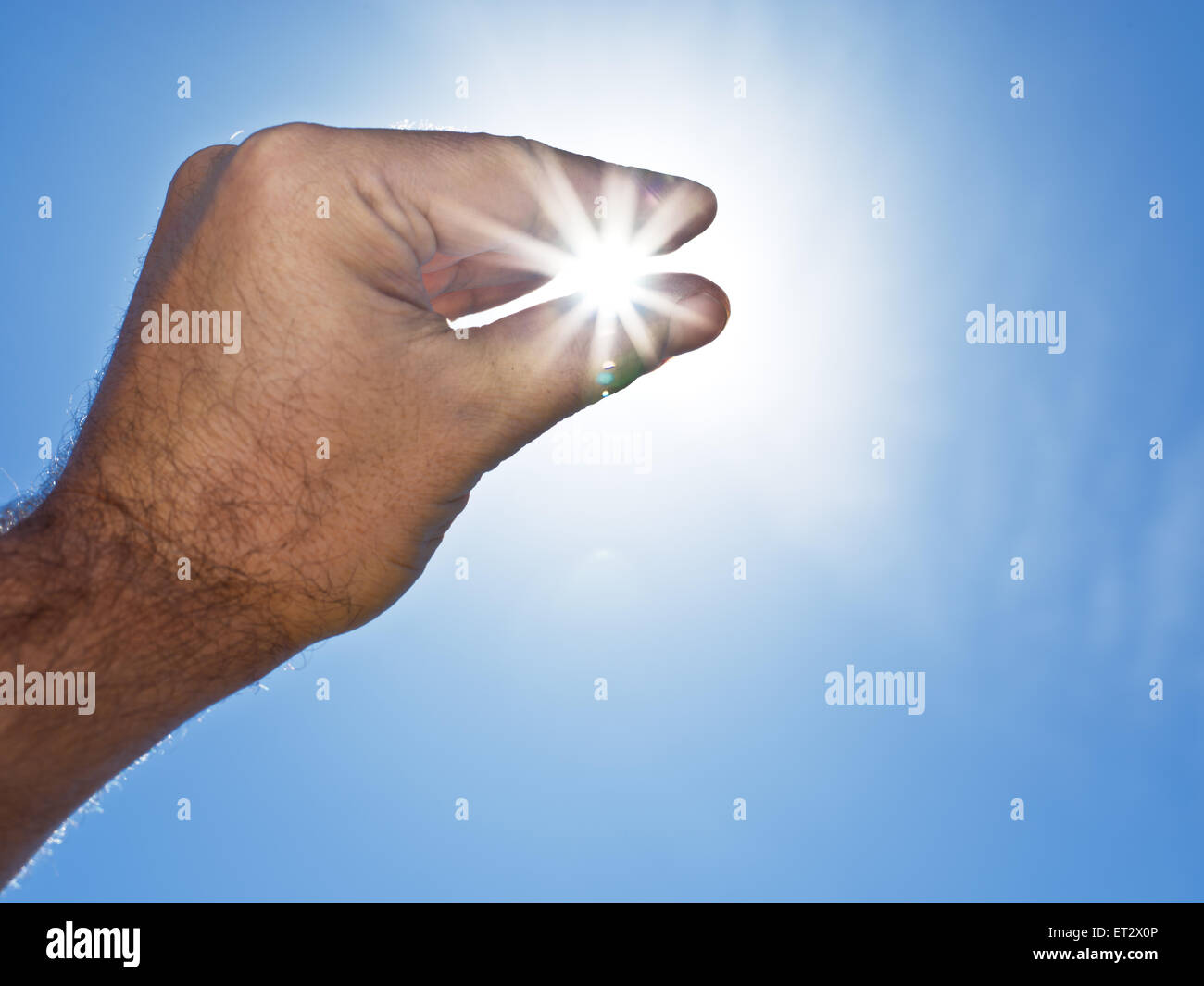 Sonne "in die Hand des Mannes". Stockfoto