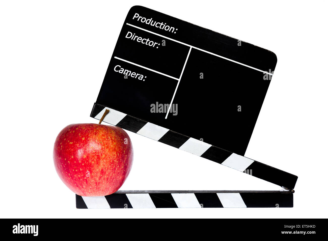 Roter Apfel und Film Klappe - weißer Hintergrund Stockfoto