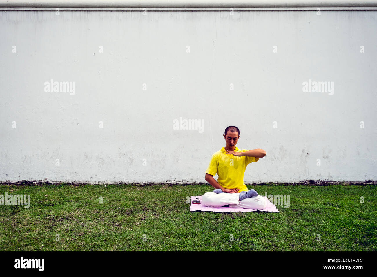 Asien. Thailand, Bangkok. Menschen Yoga zu praktizieren. Stockfoto