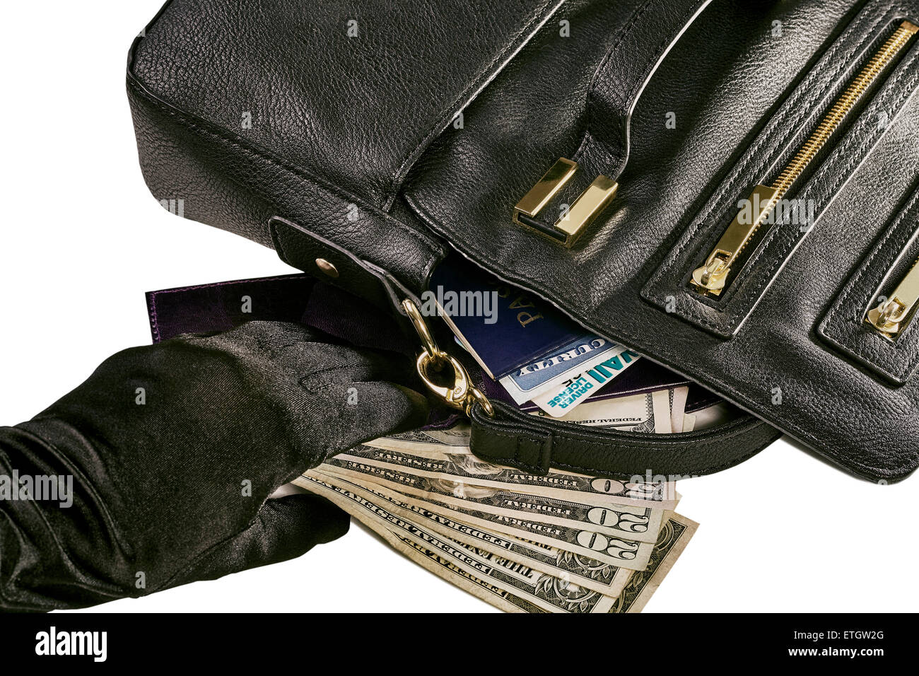 Bild von einer behandschuhten Hand Racing für Geld und eine Geldbörse offenbart einen Reisepass, Sozialversicherung Karte und Treiber Lizenz mit einem schwarzen Stockfoto