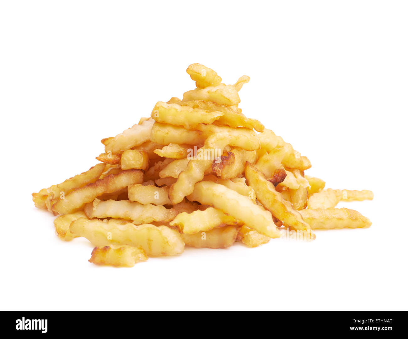 Haufen von mehreren gewellten Pommes frites isoliert Stockfoto