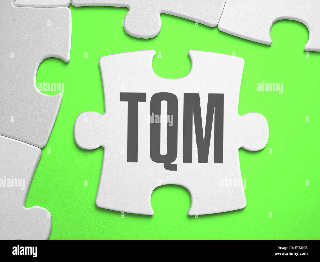 TQM - Puzzle mit fehlenden Teile. Stockfoto