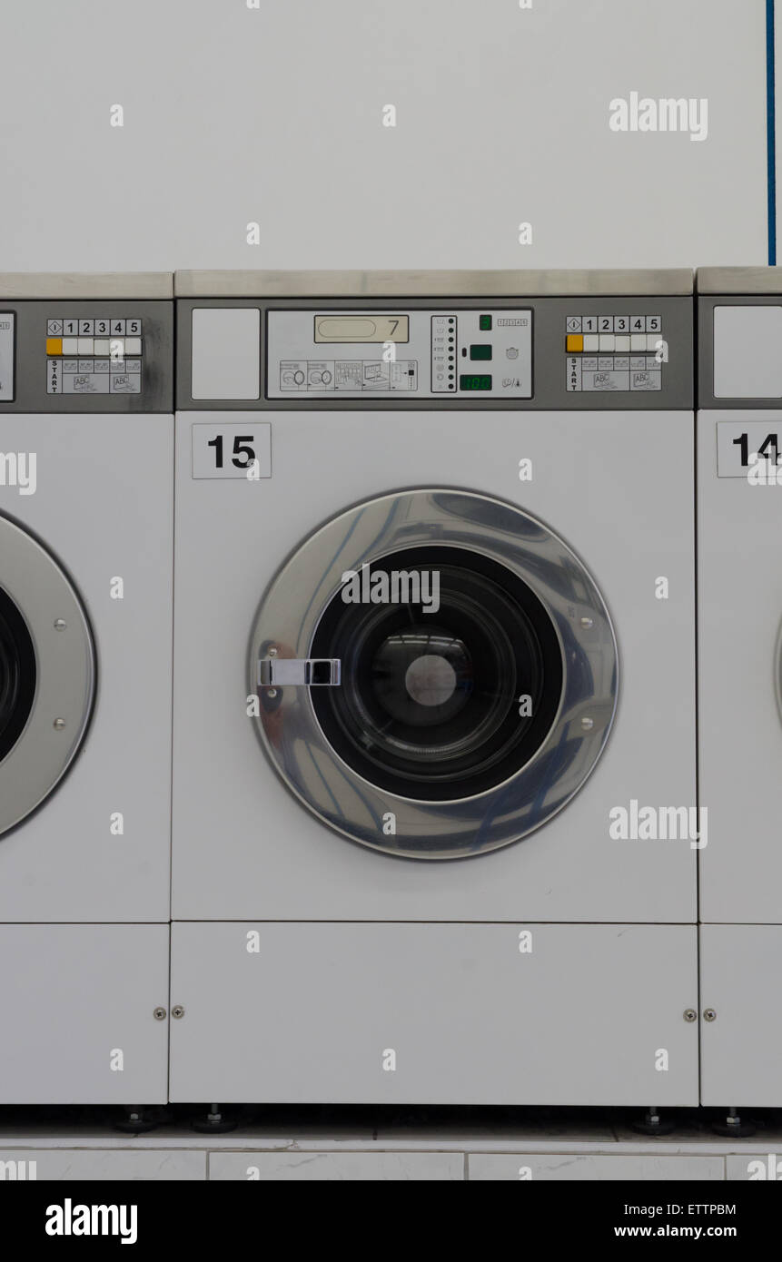 Graue und weiße Münze Waschmaschine Stockfotografie - Alamy