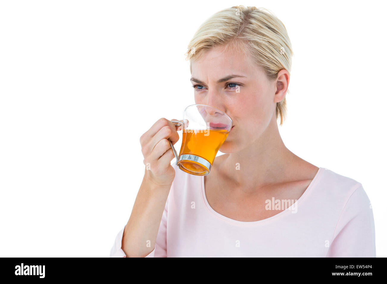 Attraktive blonde Frau Tee trinken Stockfoto
