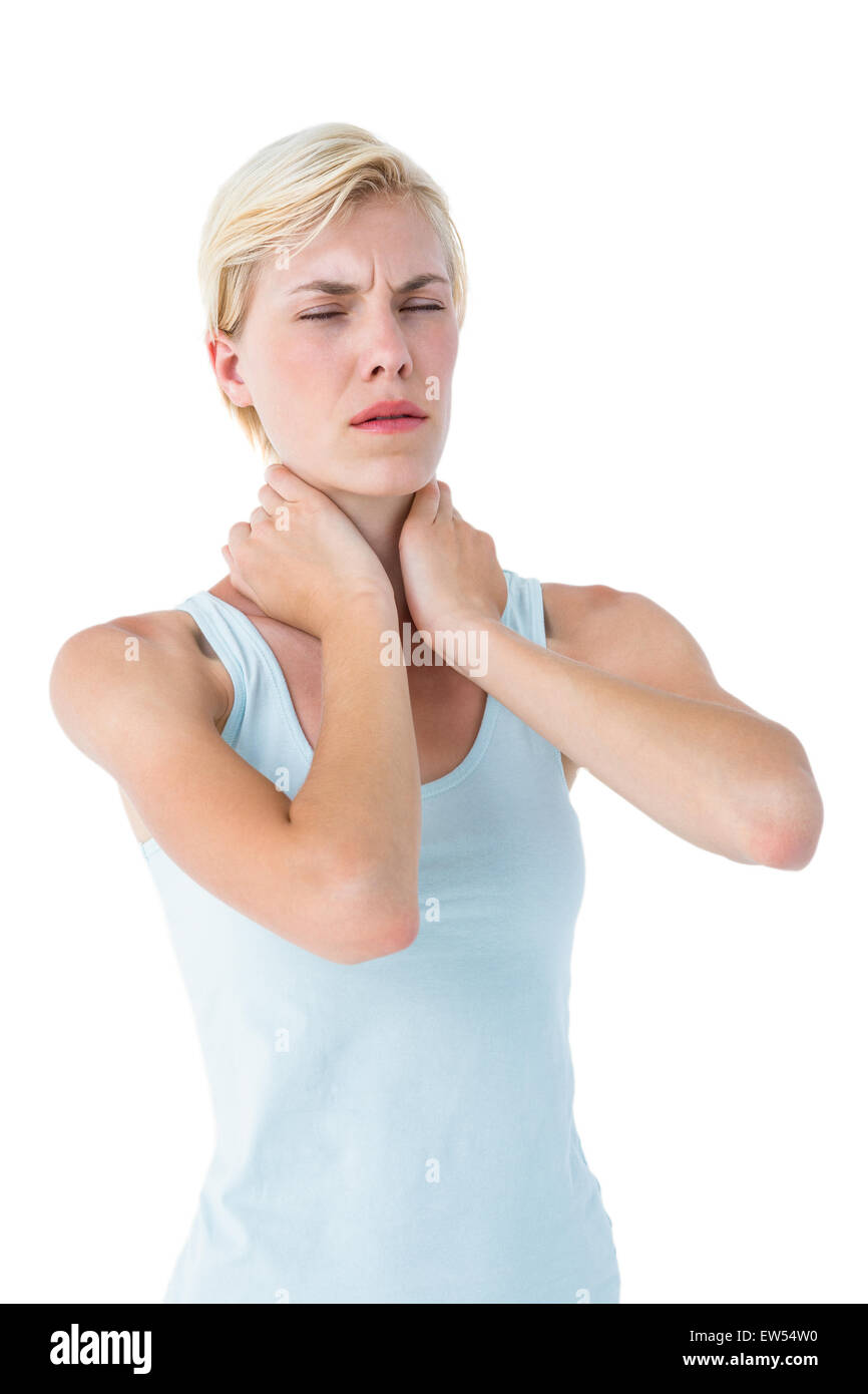 Attraktive Frau mit Nackenschmerzen Stockfoto