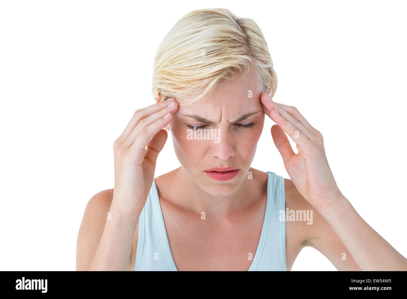 Attraktive Frau mit Kopfschmerzen Stockfoto