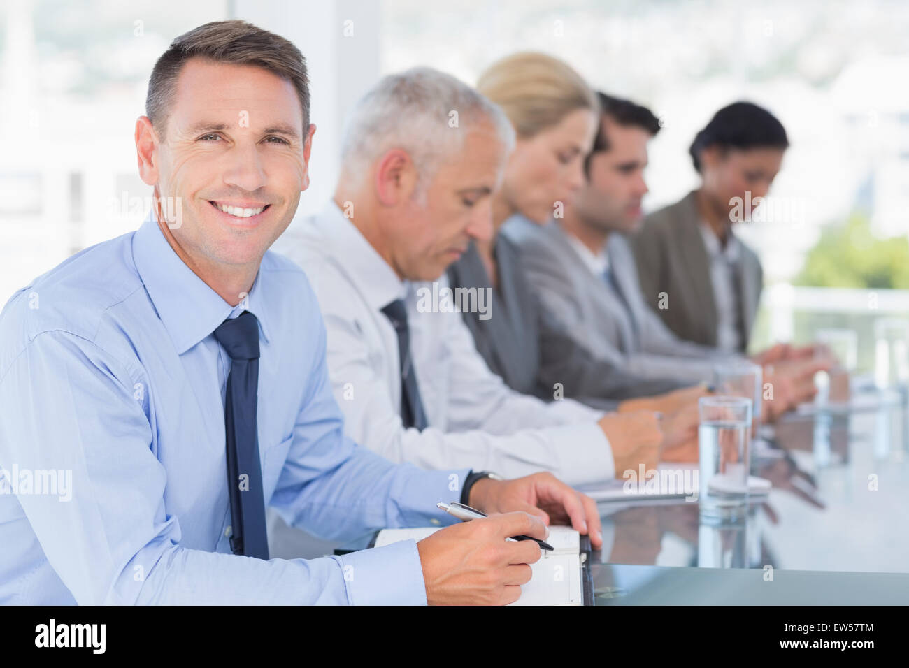 Business-Team Notizen während der Konferenz Stockfoto