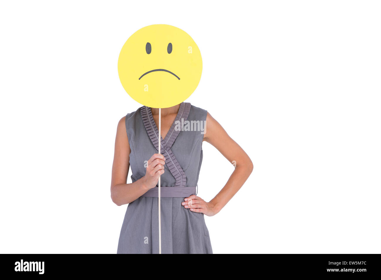 Geschäftsfrau Holding traurige Smiley-Gesicht Stockfoto