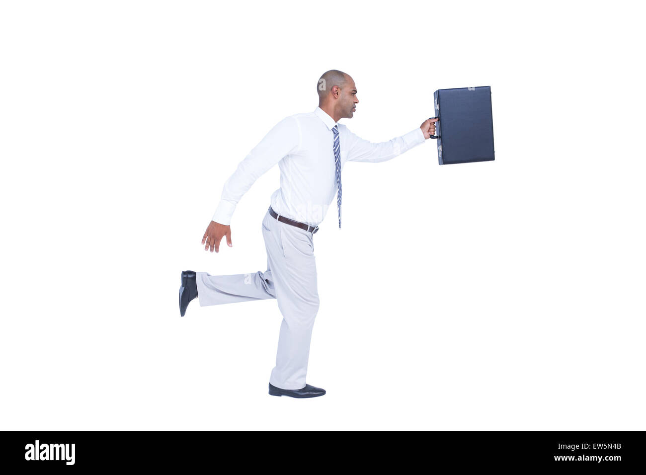 Geschäftsmann laufen und halten Aktentasche Stockfoto