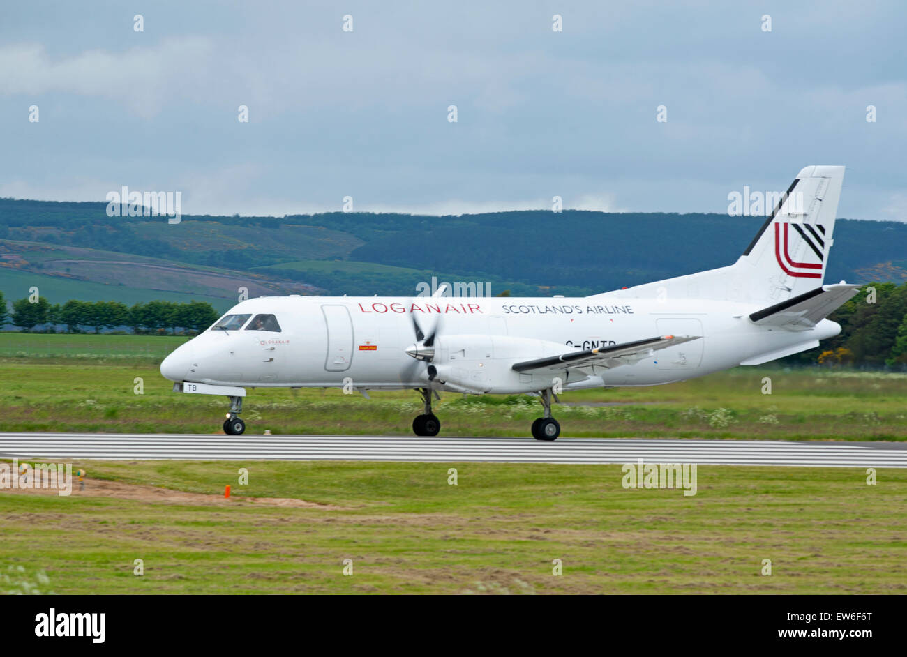 Loganair Saab 340A Schottlands Airline am Flughafen Inverness Dalcross.  SCO 9891. Stockfoto