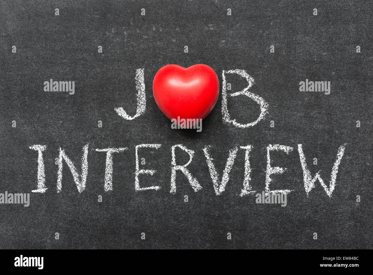 Job Interview Ausdruck handschriftlich auf Tafel mit Herzsymbol statt O Stockfoto