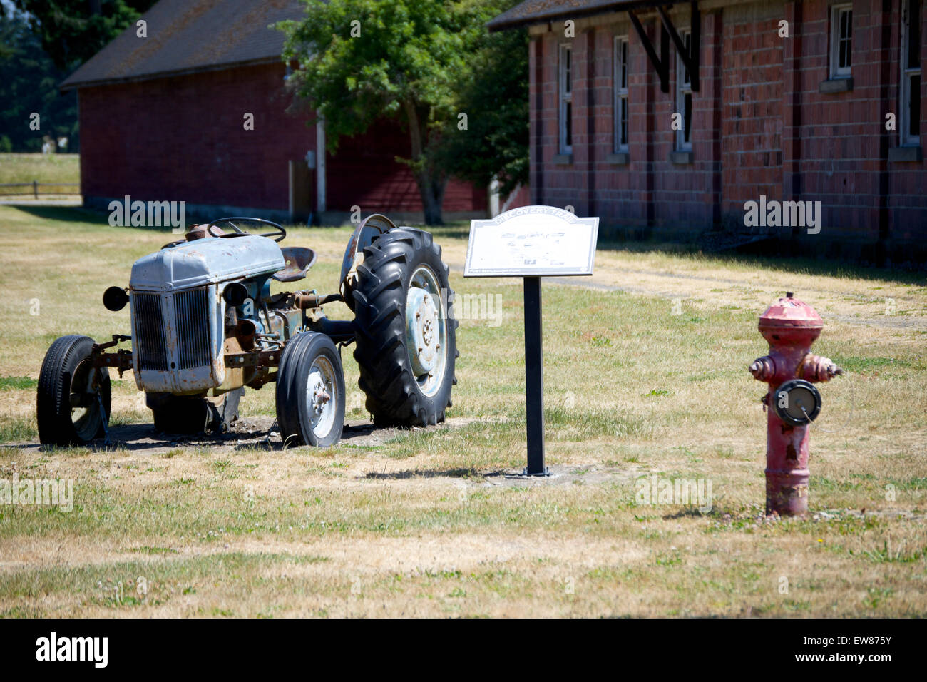 Oldtimer-Traktor und Hydranten Stockfoto