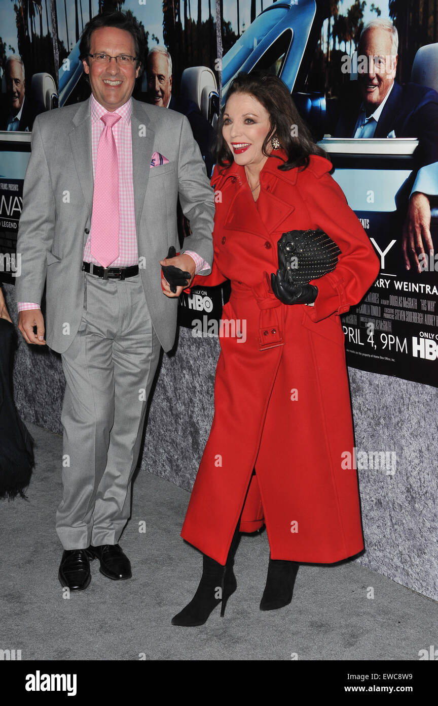 LOS ANGELES, CA - 22. März 2011: Joan Collins & Ehemann Percy Gibson bei der Premiere von "Seinen Weg" über Jerry Weintraub in den Paramount Studios in Hollywood. Stockfoto