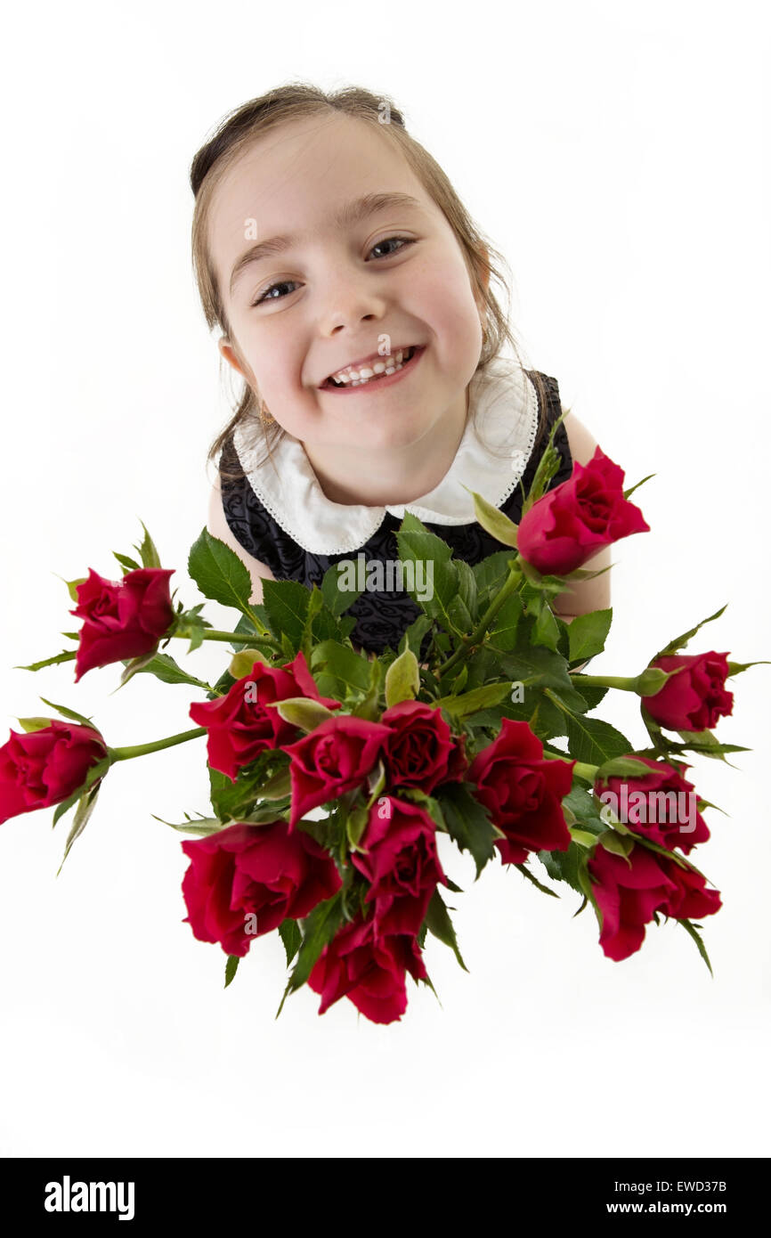 Blick hinunter auf junge Mädchen halten Blumen schauen sehr glücklich mit einem Lächeln Stockfoto