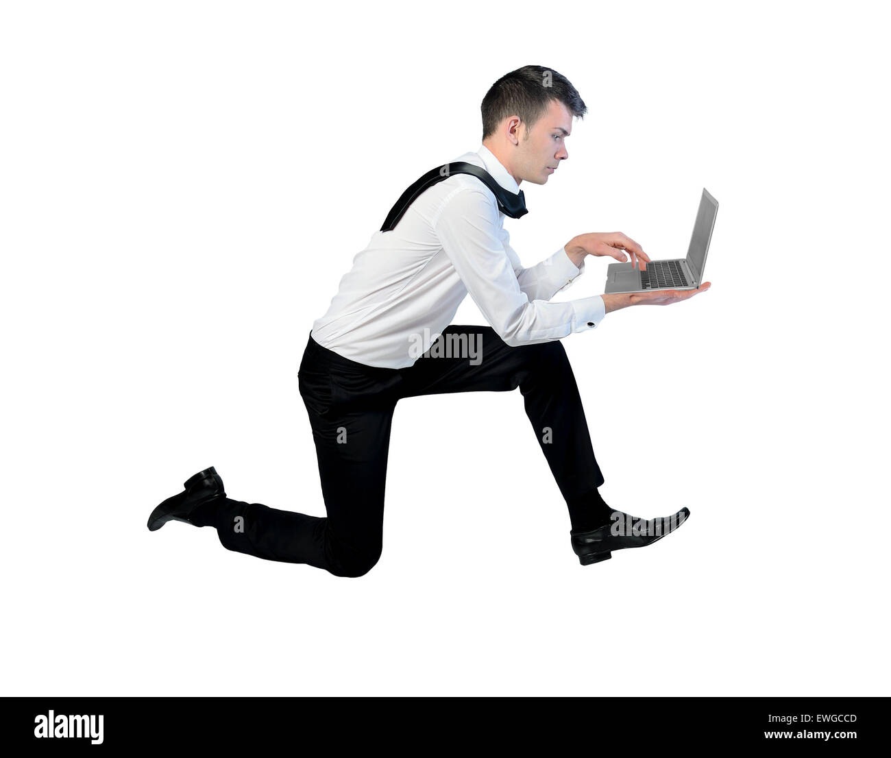 Business-Mann mit Laptop laufen Stockfoto