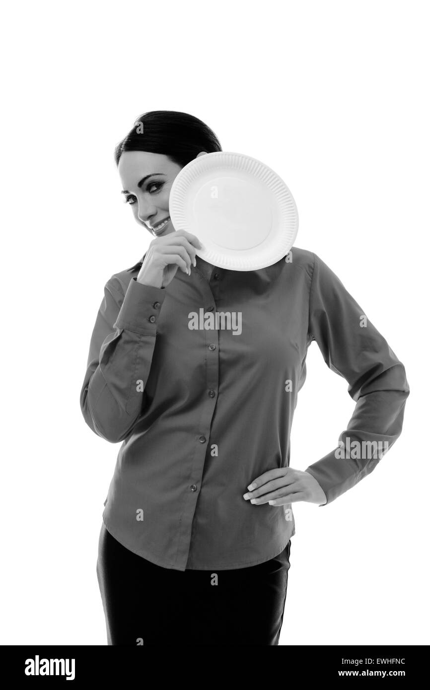 Geschäftsfrau hält einen Pappteller bis zu ihrem Gesicht Stockfoto