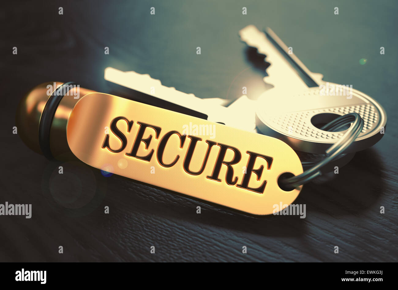 Secure - Schlüsselbund mit Text auf goldenen Schlüsselanhänger. Stockfoto