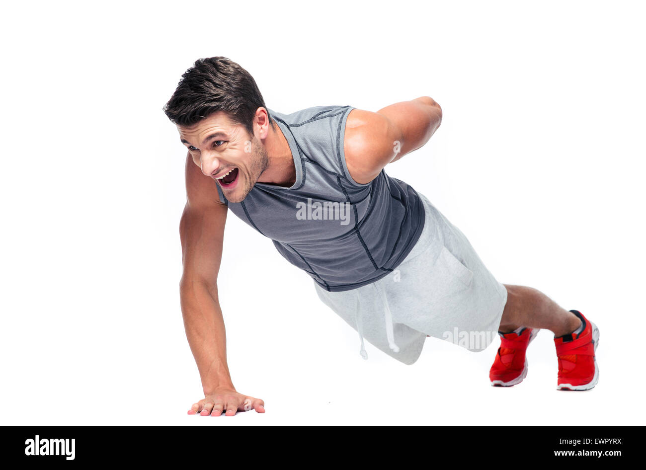 Fitness jungen Mann tut Push Ups mit einer Hand auf einem weißen Hintergrund isoliert Stockfoto