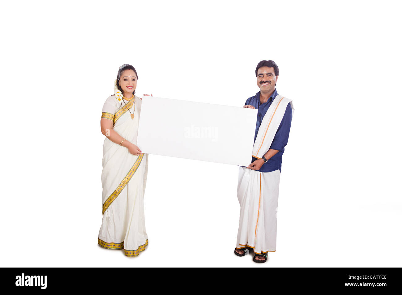 2 South Indian verheiratet Paare zeigen Message Board Stockfoto