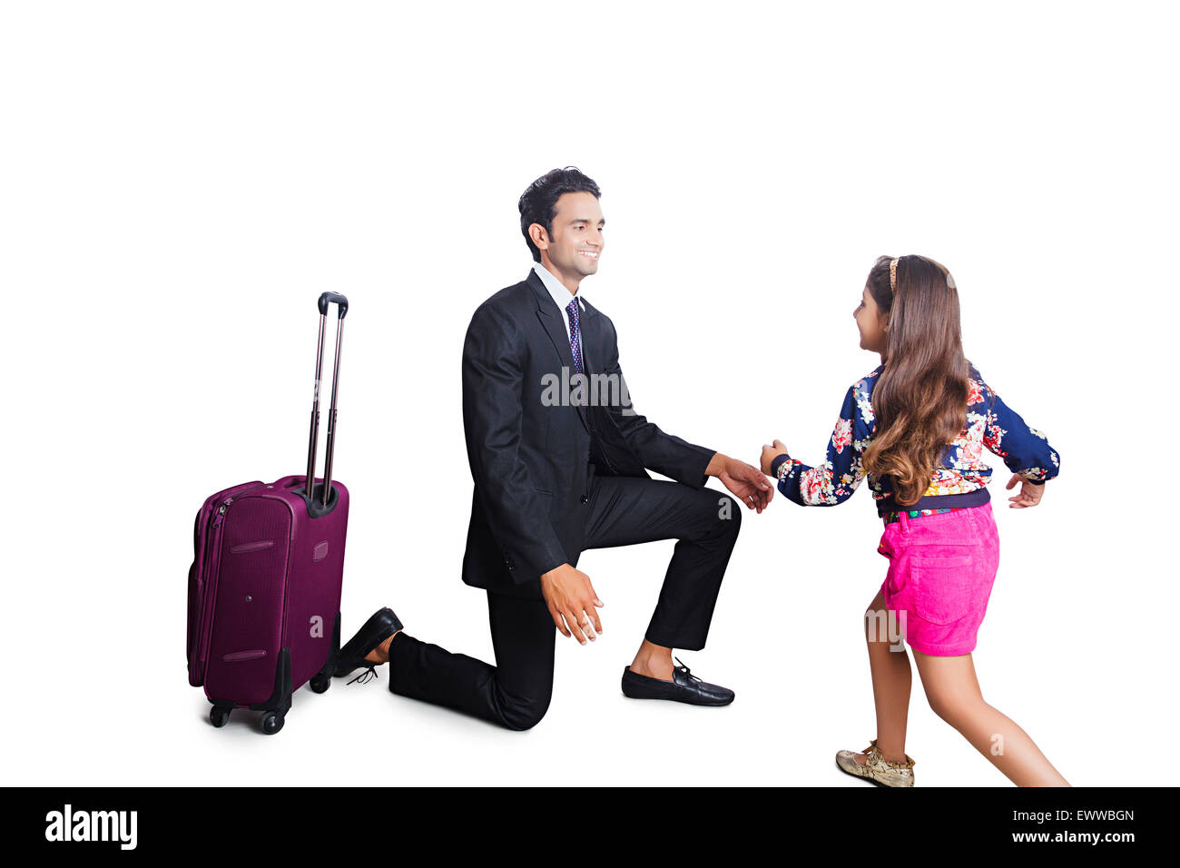 indische Vater und Tochter erreichen Stockfoto